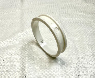 Втулка розпірна шкворня 53205-3001017 (фторопластова)