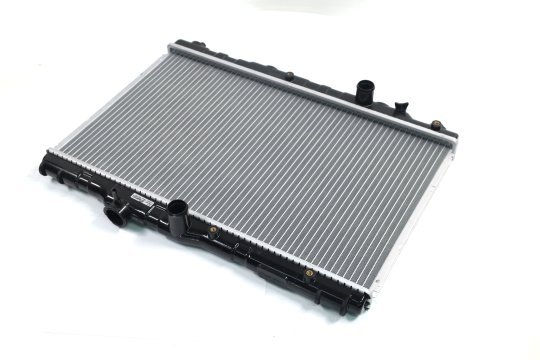 Радіатор охолодження COROLLA EE90 1.3MT 87-92(вир-во AVA)