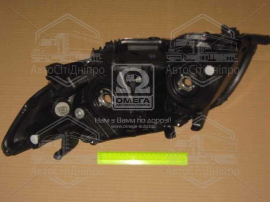 Фара пра. TOY COROLLA 06-09 (вир-во TYC)