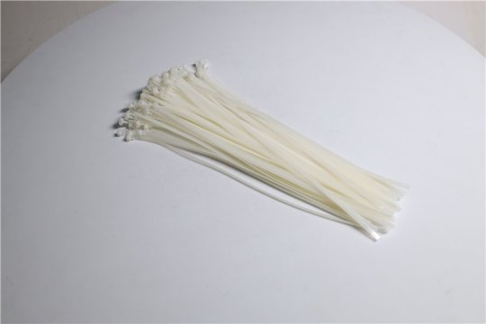 Хомут пластиковий багаторазового використання 6х450 мм., білий 100 шт./уп. <ДК>